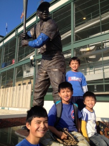 Etha, Erik, Henry & Lu with the Ernie Banks statue before the game